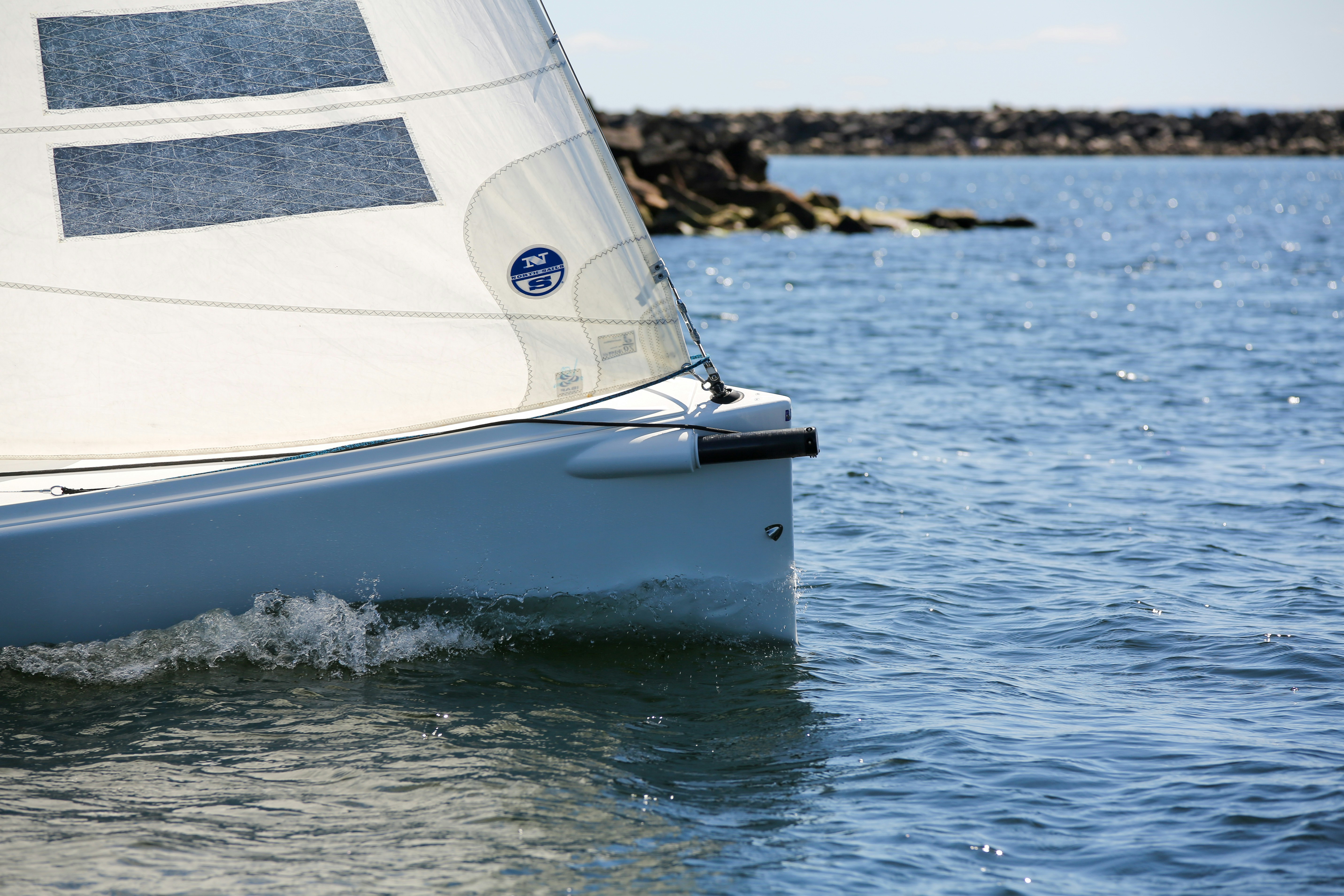 white sailboat on sea during daytime