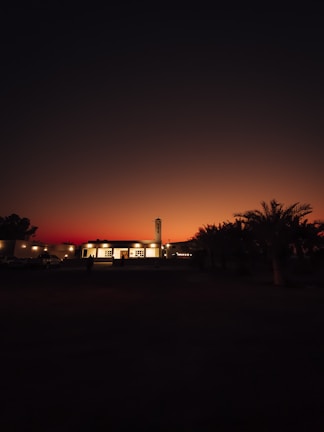 A serene view of the Prophet's Mosque in Medina at sunset.