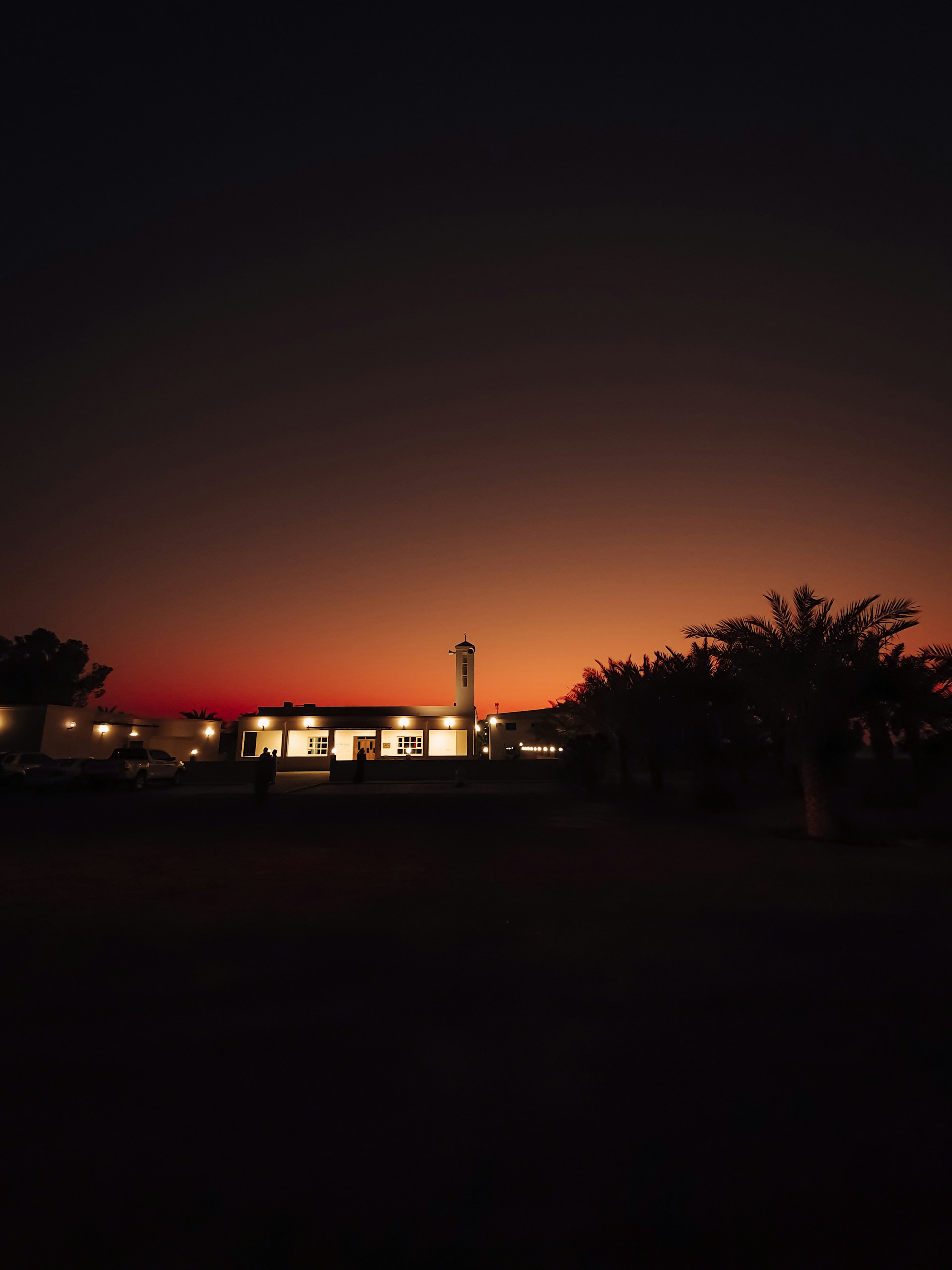 woman wearing yellow long-sleeved dress under white clouds and blue sky during daytime