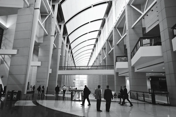McCormick Place convention center interior with attendees walking through exhibit hall