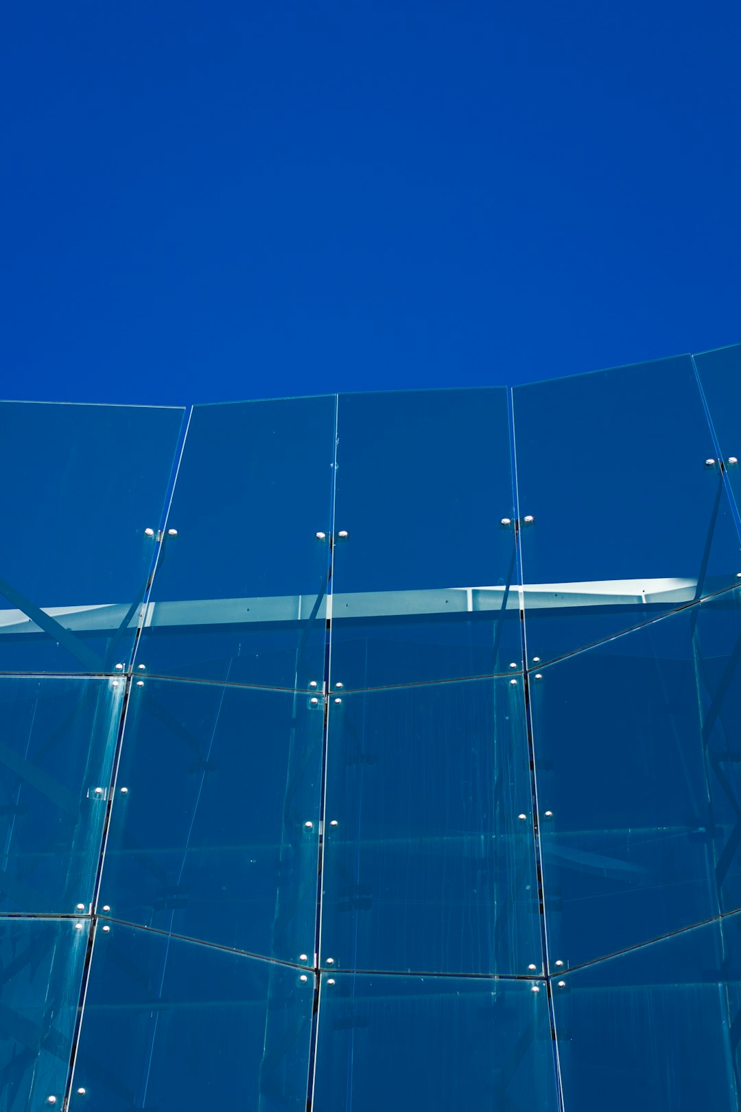 Professional installing solar window film
