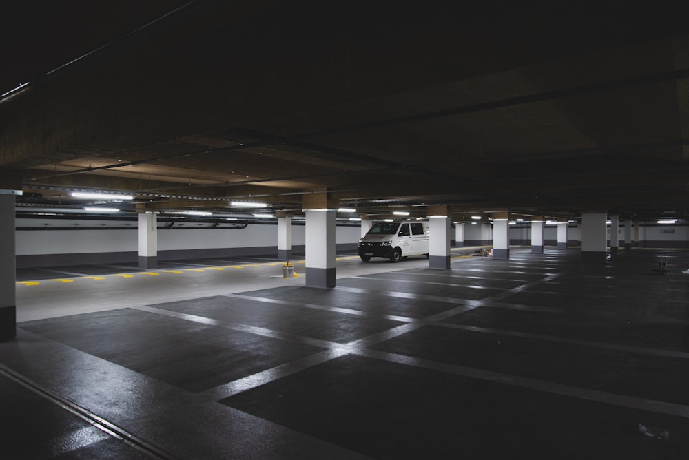 cars parked on parking lot during night time