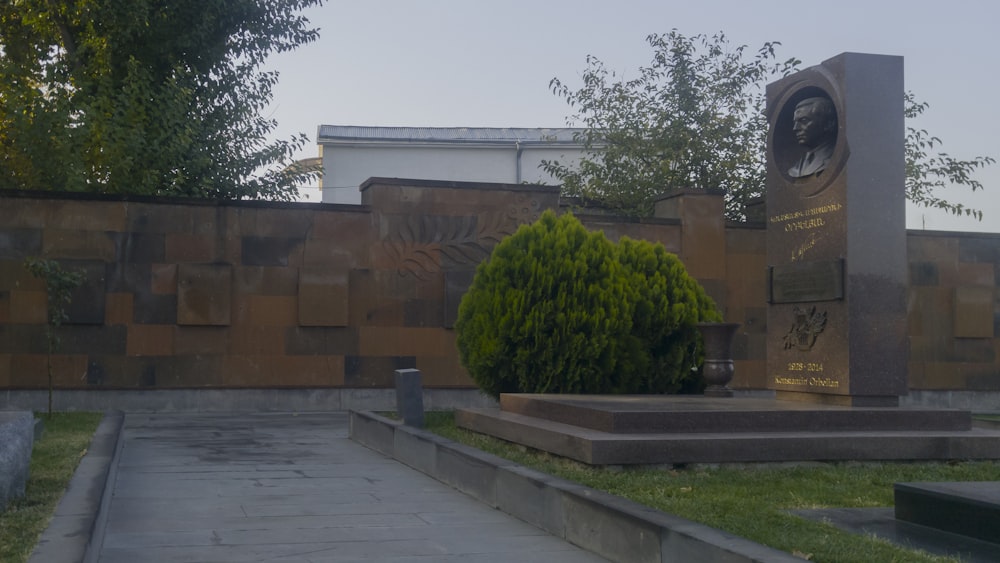 green trees near brown concrete building during daytime