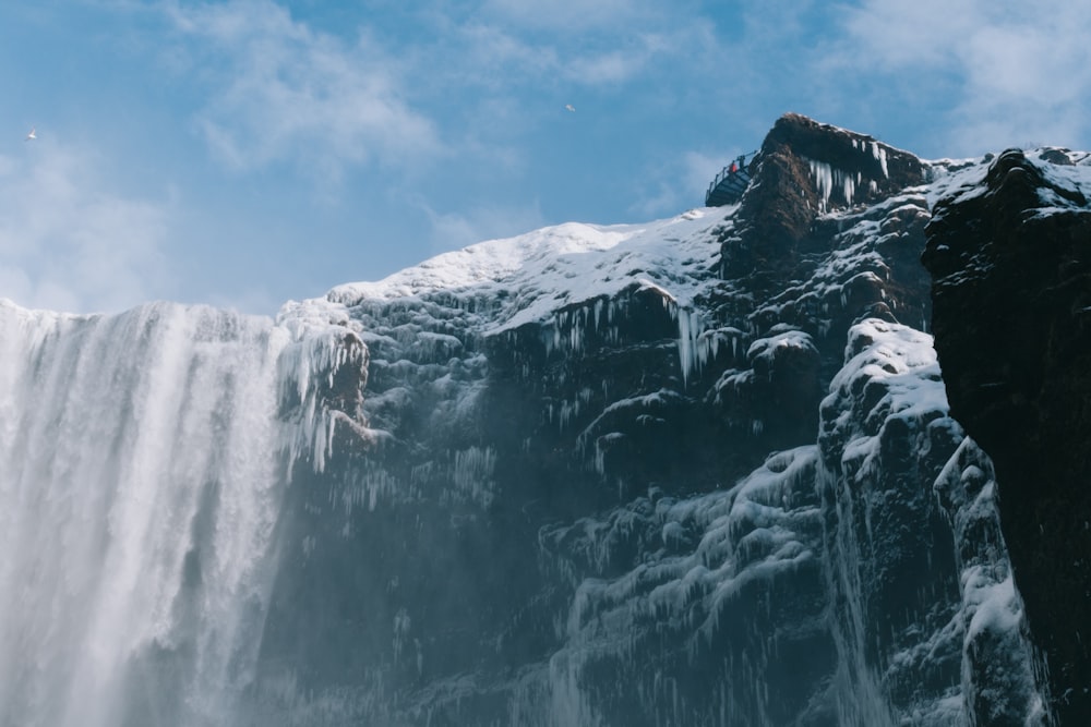 snow covered mountain under blue sky during daytime