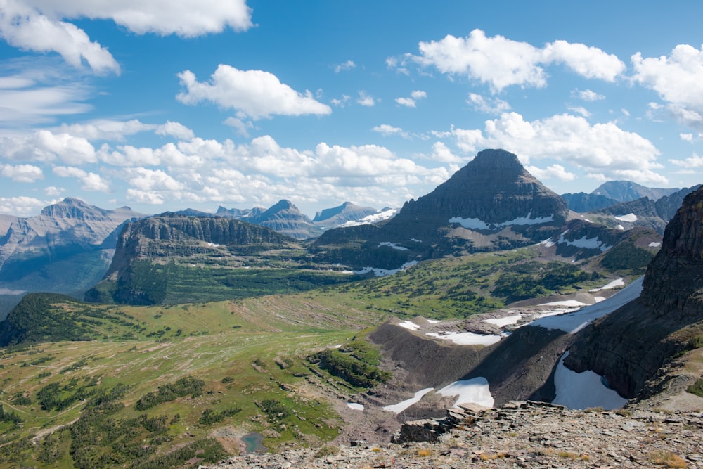 green and brown mountains under blue sky during daytime