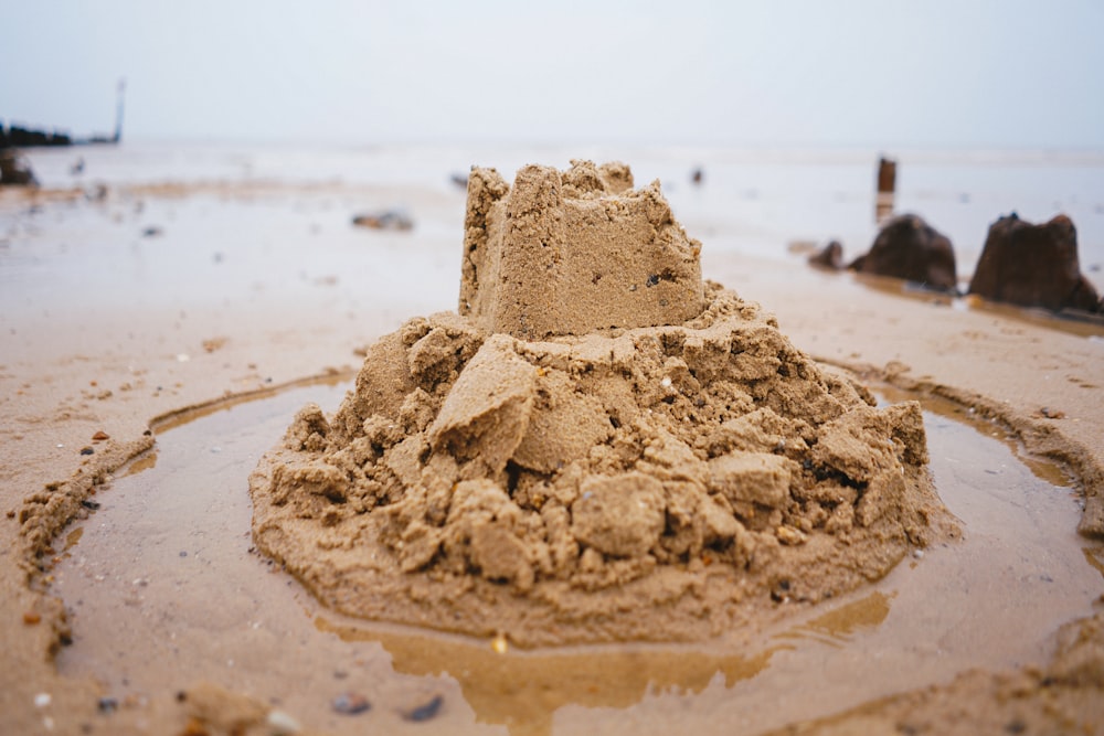 brown sand on beach during daytime