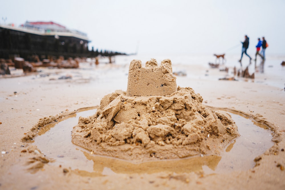 brown sand on beach during daytime