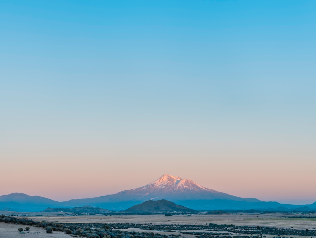 white and brown mountain under blue sky during daytime