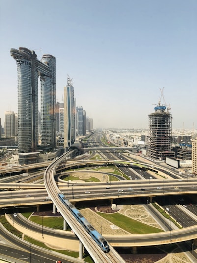 city buildings under blue sky during daytime