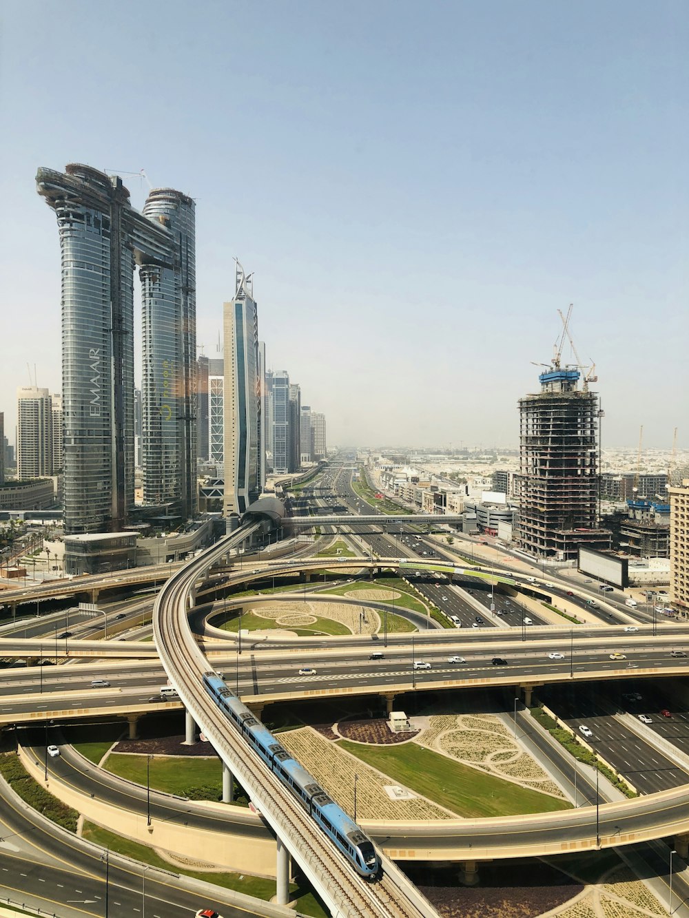 city buildings under blue sky during daytime