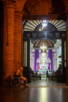 An elder delivering a sermon with passion and wisdom in a beautifully designed sanctuary.