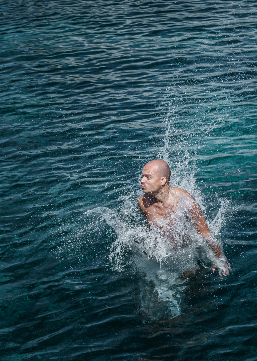 man in water during daytime