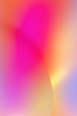 Bright tee mockup featuring a dynamic pink-to-yellow gradient with splatter accents.