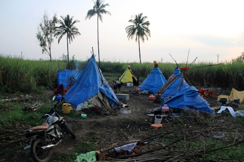 Volunteers setting up a medical camp in a rural village