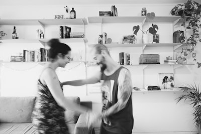 A candid shot capturing the daughters rehearsing in their cozy living room, passion in every motion.