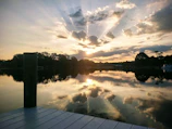 Sunset over the lake with the Waterfront Paradise II cottages reflected in the water