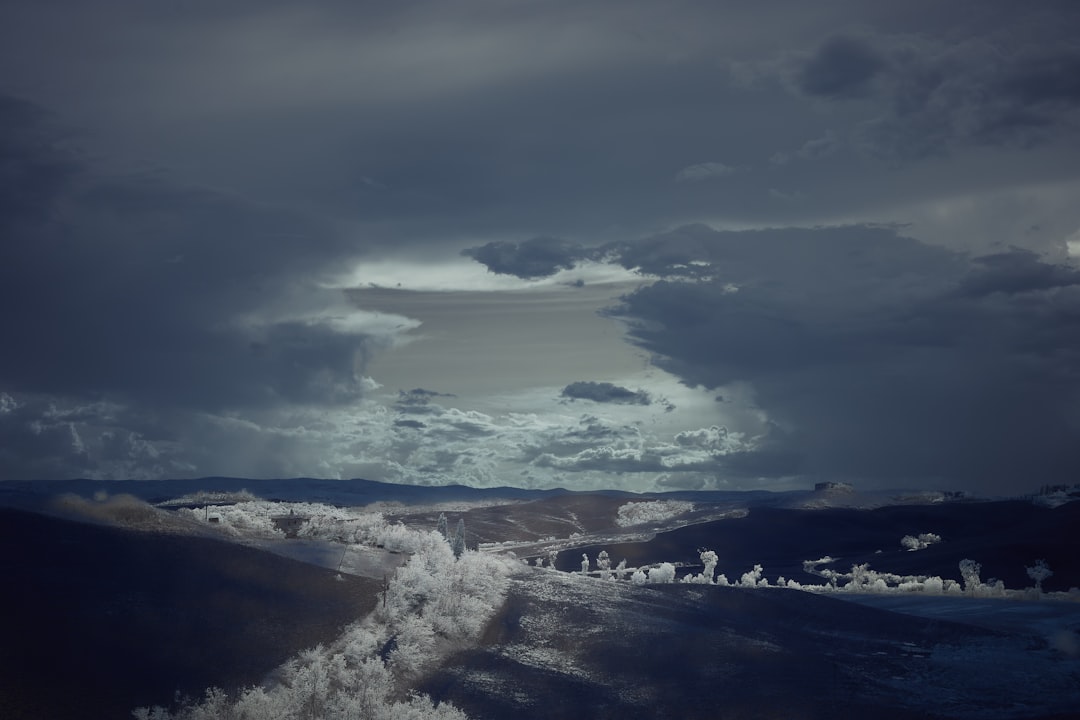 white clouds over the mountains