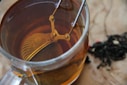 a tea ball in a cup of tea