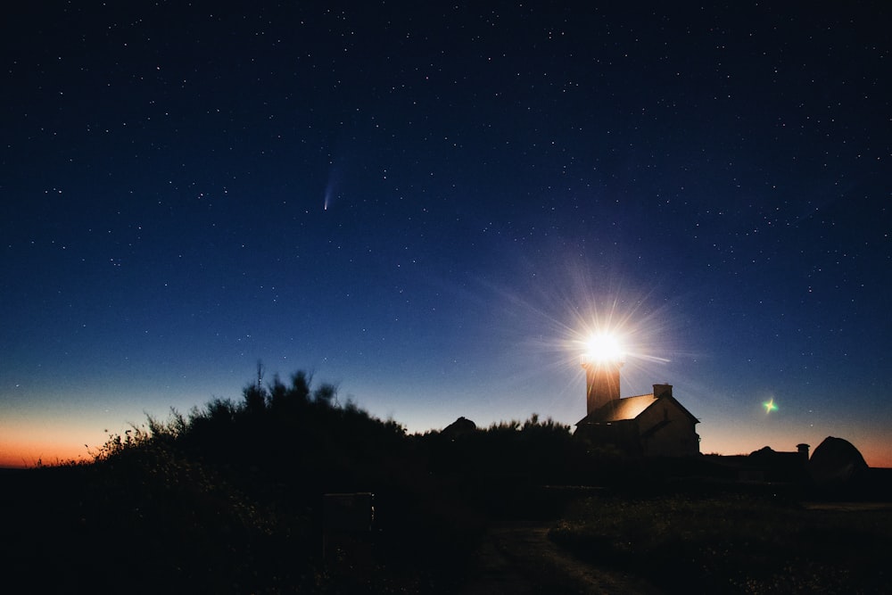 brown house under blue sky during night time