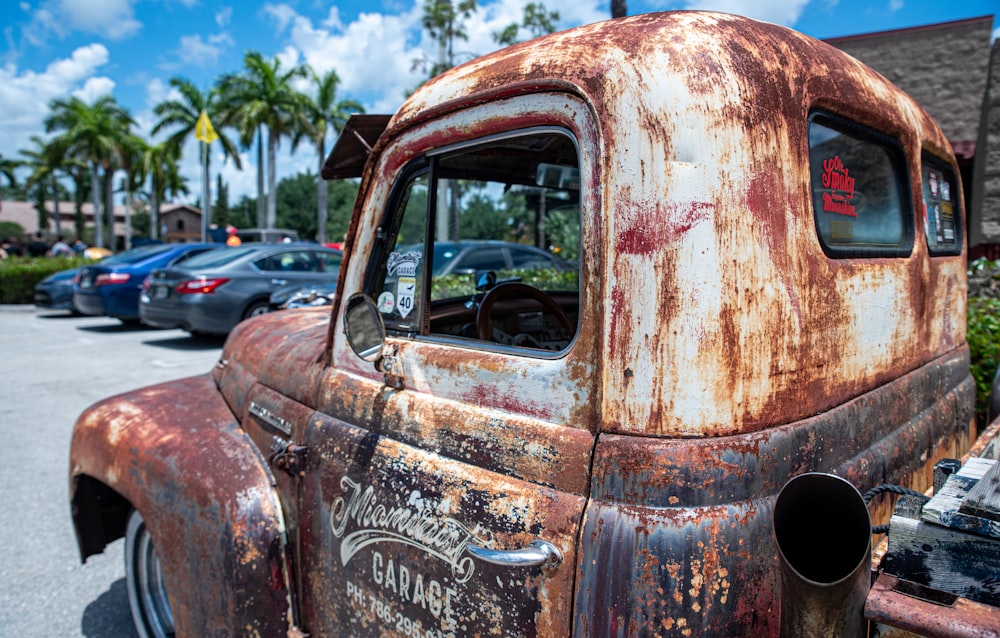 brown vintage car on the street during daytime