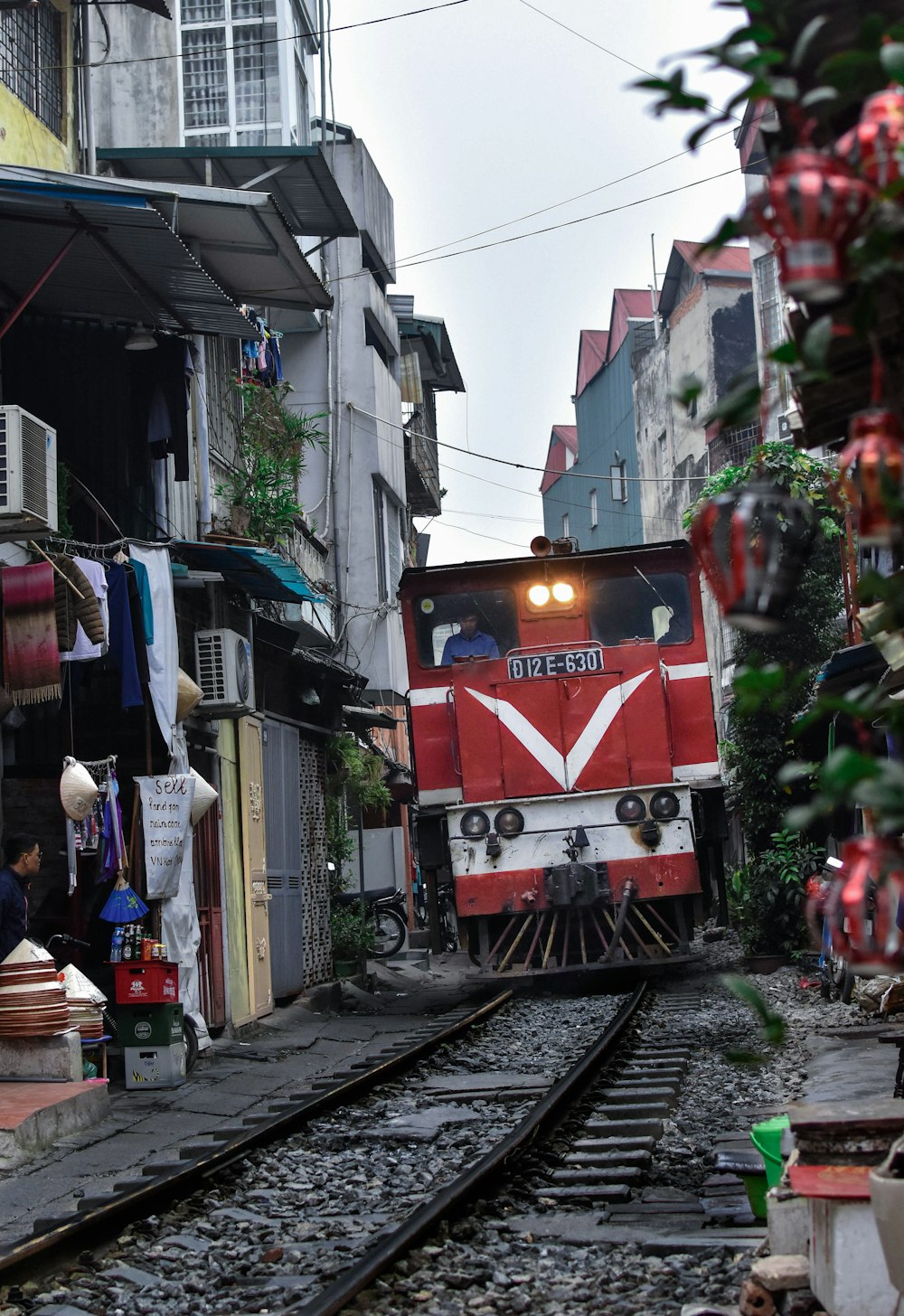 red and black train on rail road during daytime