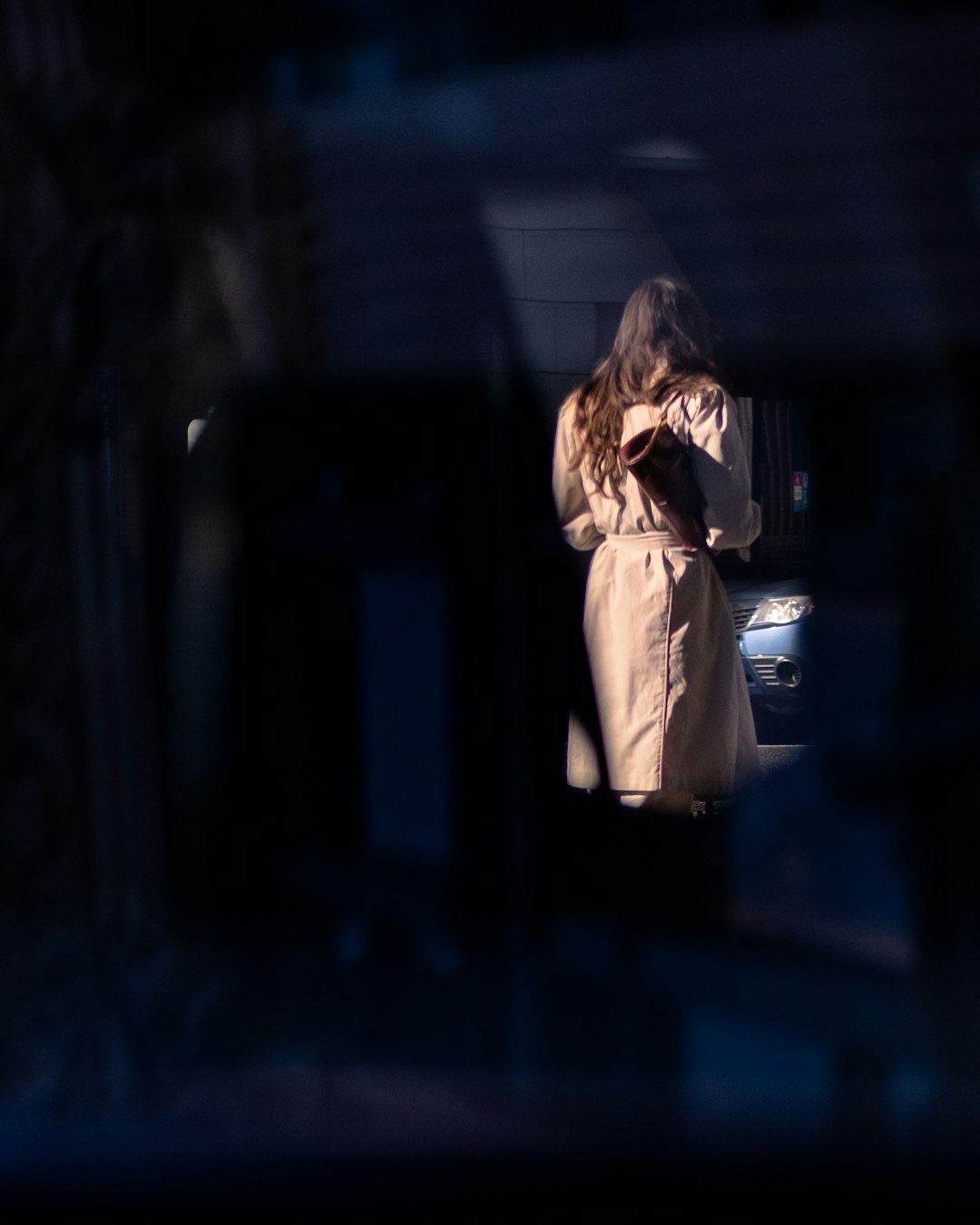 woman in white coat standing