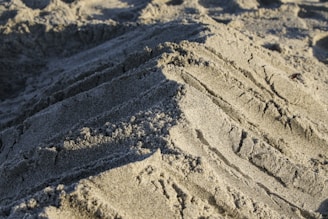 brown sand with white sand