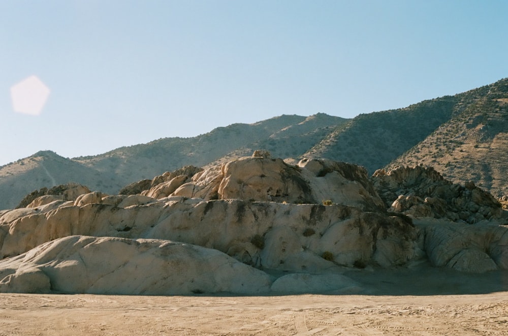 brown and gray rock formation under blue sky during daytime