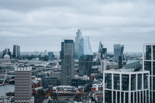 city buildings under white sky during daytime