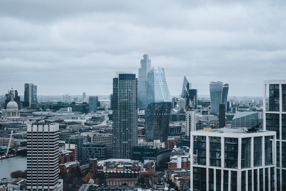 city buildings under white sky during daytime