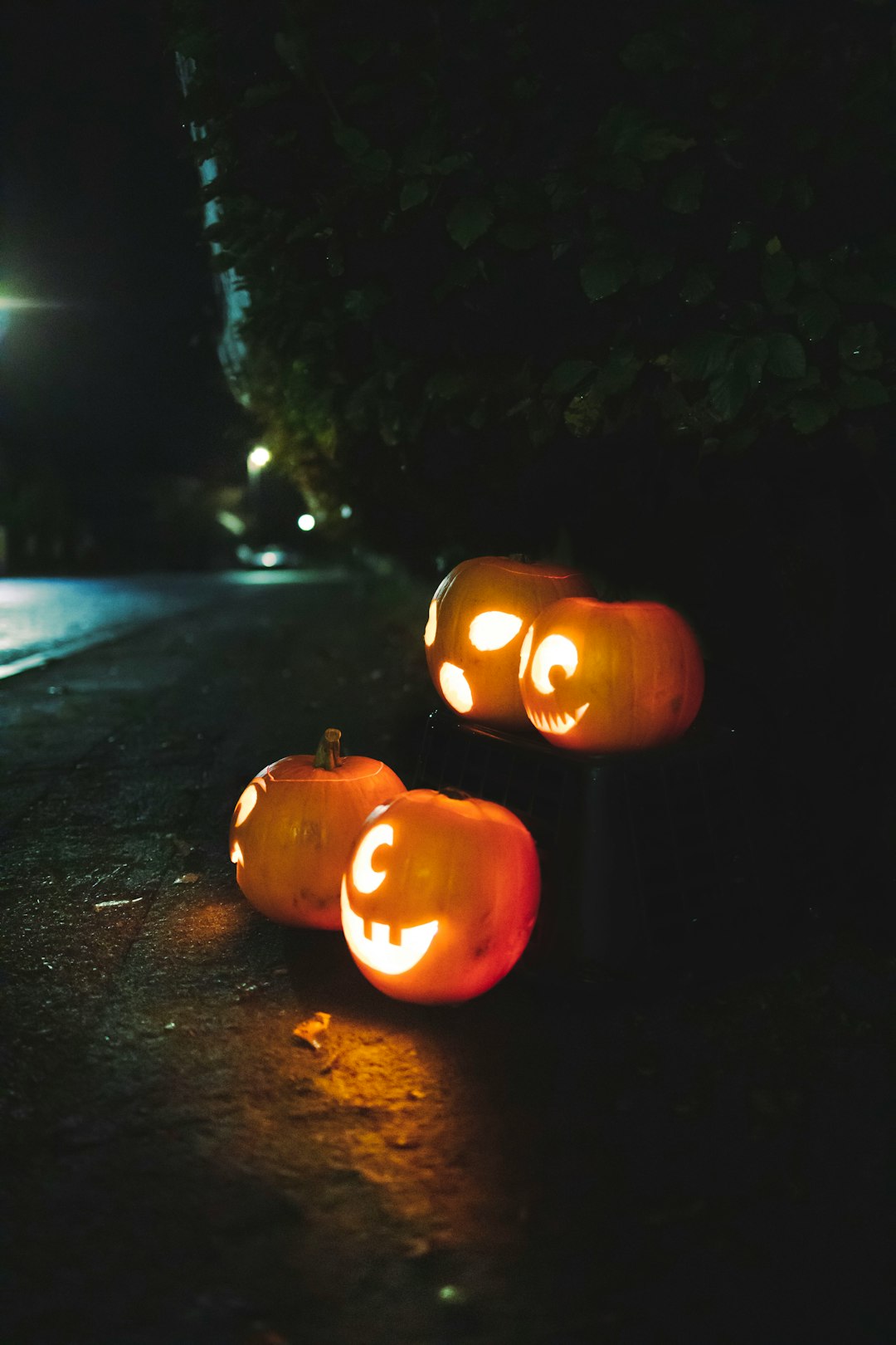 jack o lantern on black asphalt road during night time