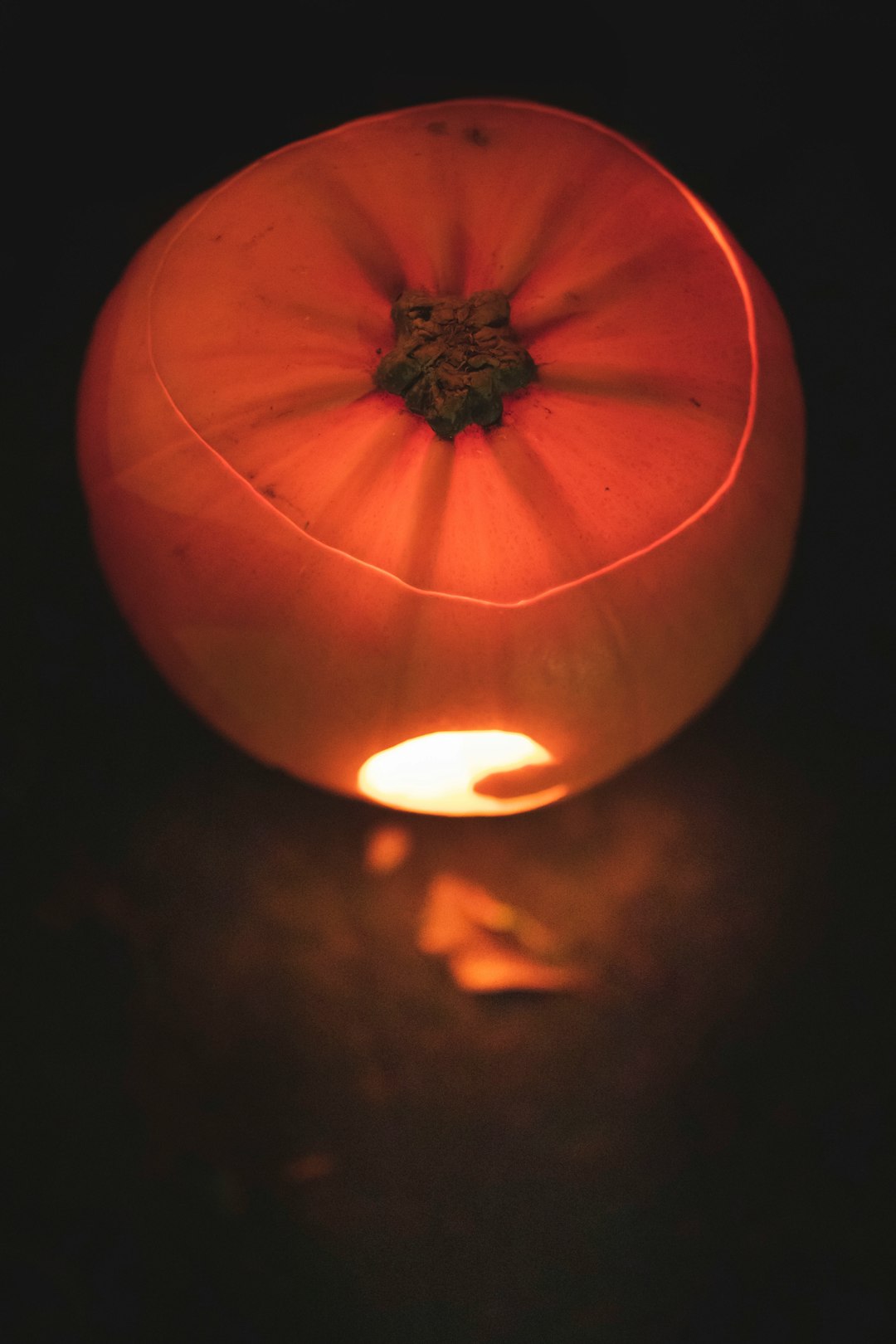 orange pumpkin with light in the middle