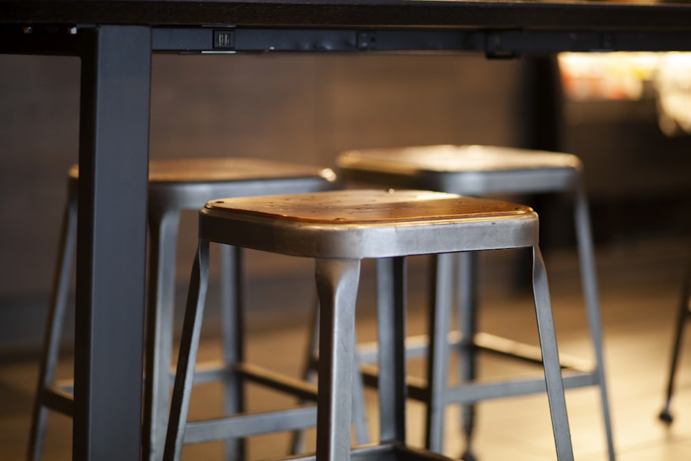 brown wooden seat chair in front of brown wooden table