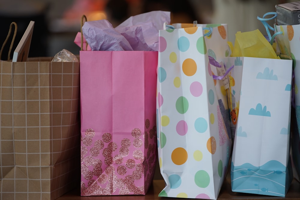 pink white and yellow polka dot paper bag