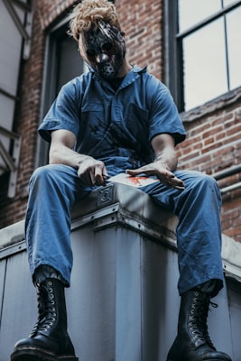 Plumber working under sink