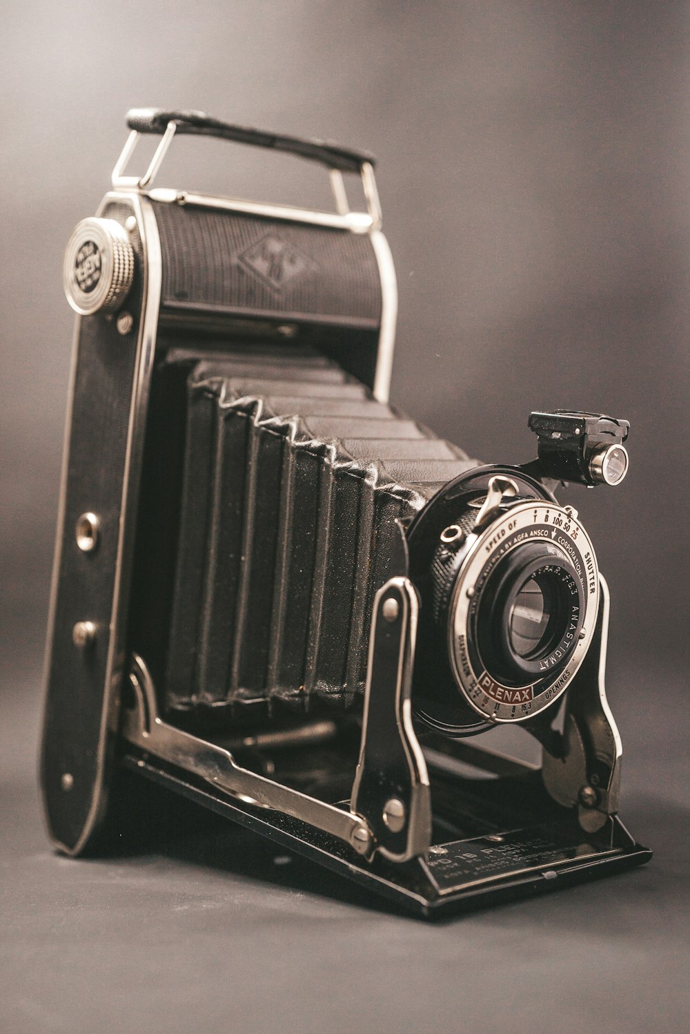 black and silver vintage camera