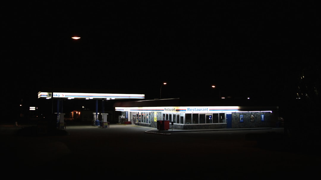 white train on rail during night time