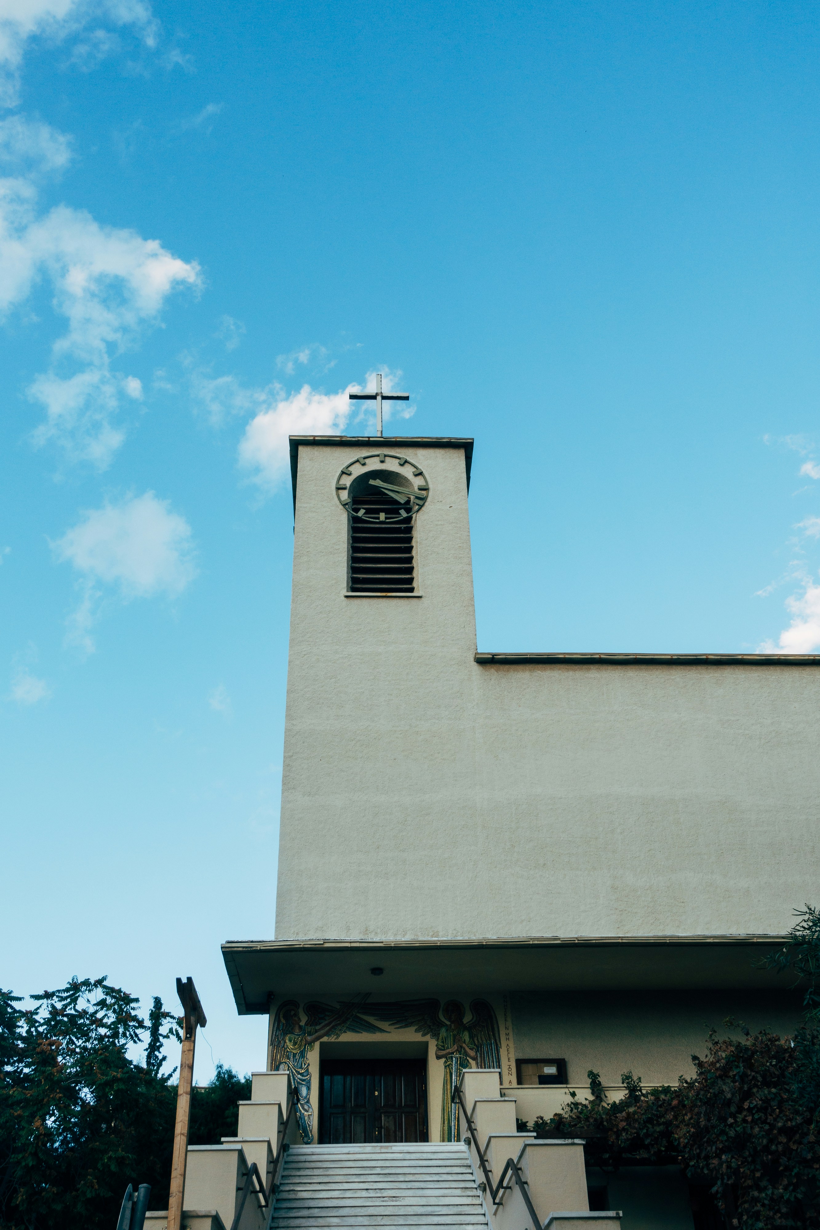 white concrete building under blue sky during daytime