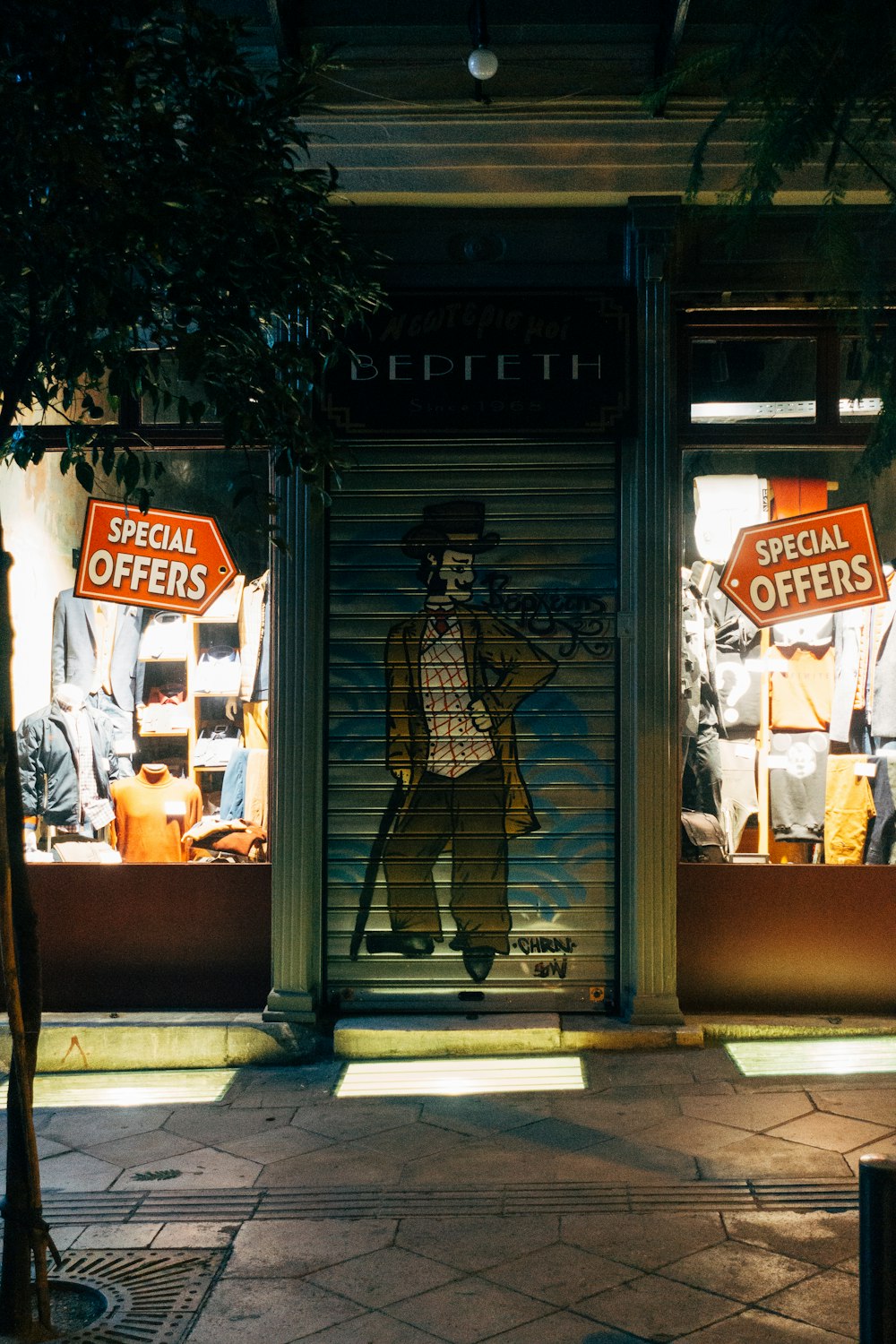 man in black and white checkered dress shirt standing in front of store