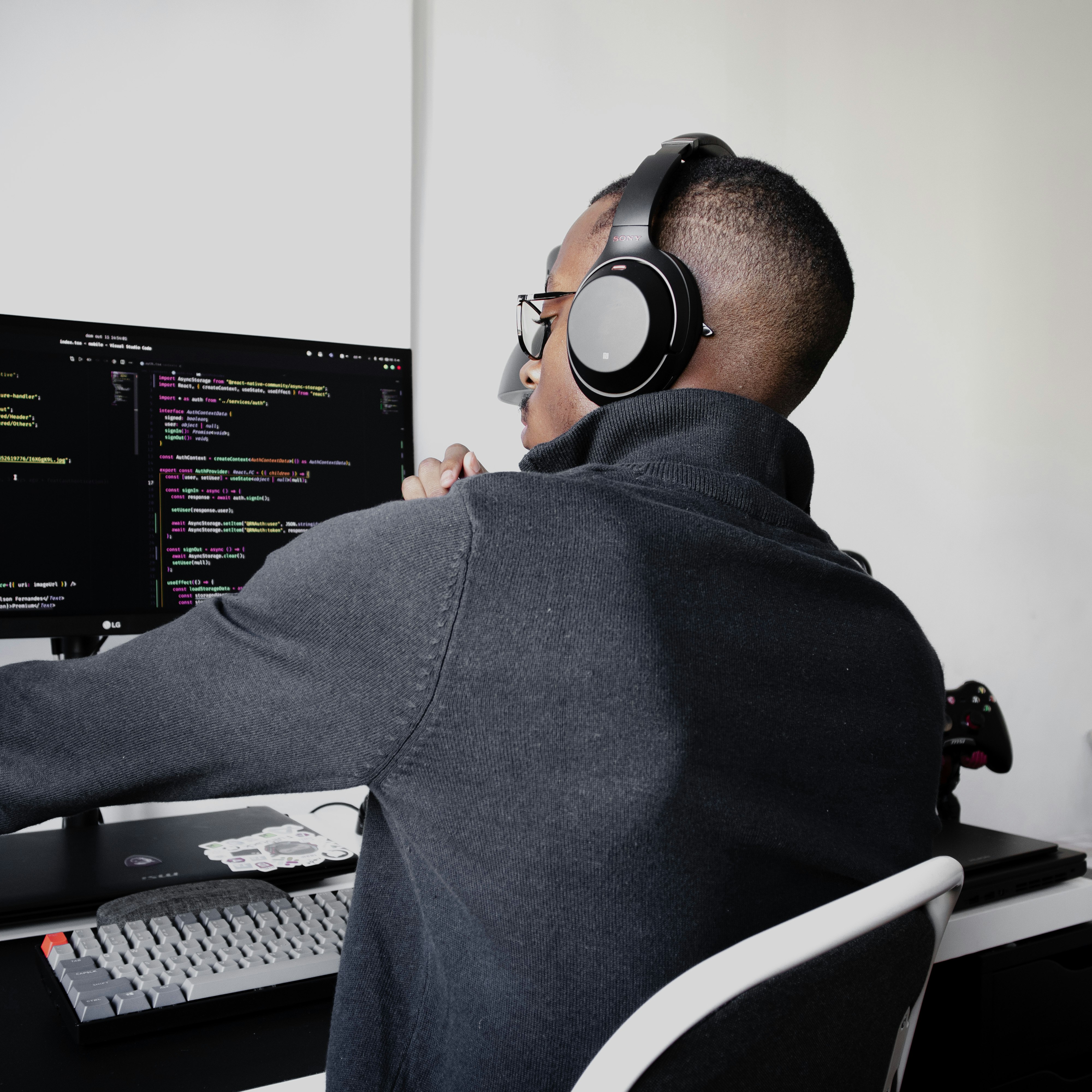 African professional at computer