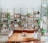 A cozy vape shop interior with shelves of products.