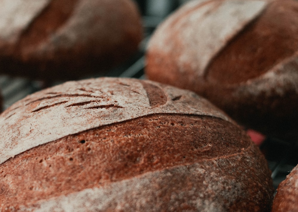 brown and white bread on brown wooden table