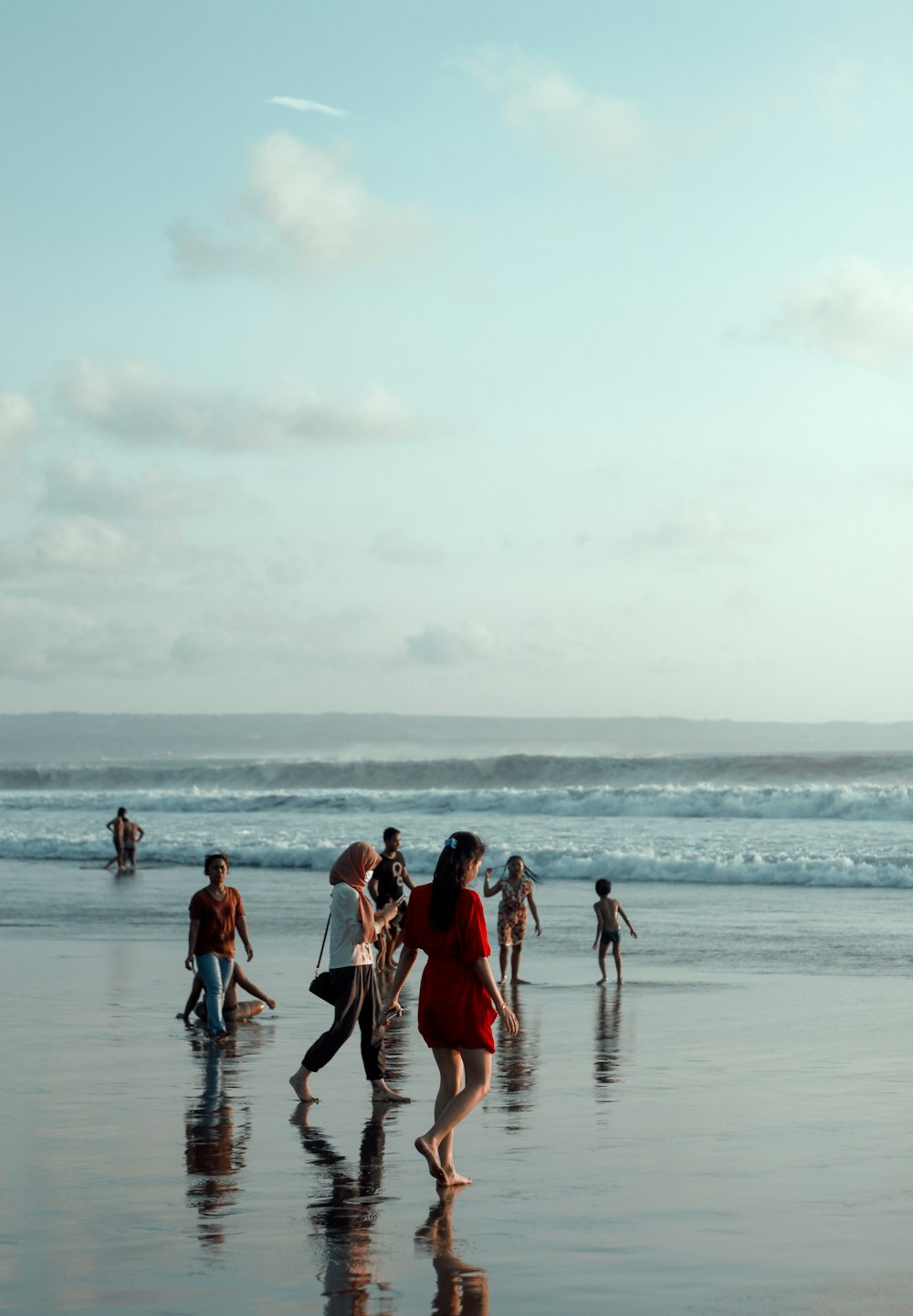 people on beach during daytime