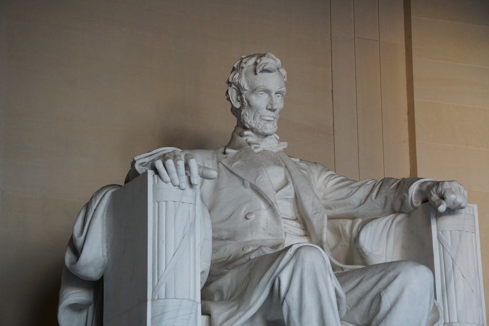 man in white robe statue