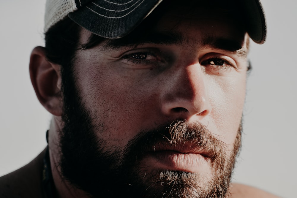 man in black and white hat