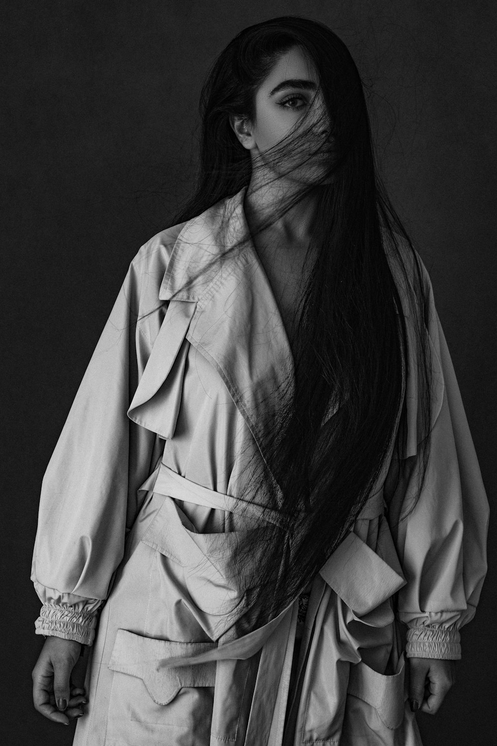 woman in white robe in grayscale photography