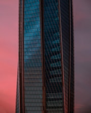 A sleek, modern residential building at sunset highlighting premium architecture.