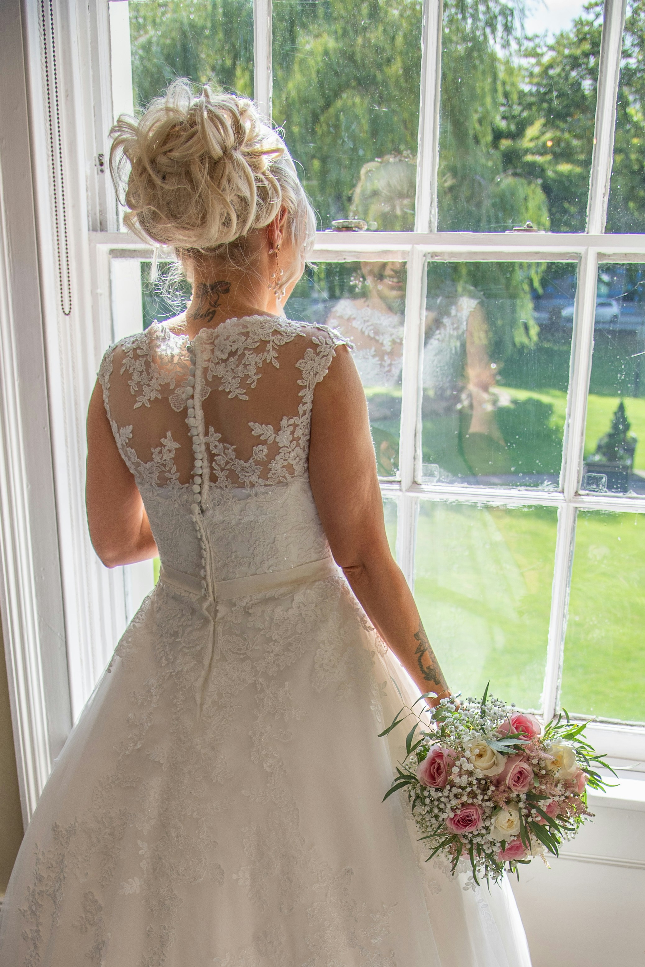 Bride on Wedding day at Sandwell Registry Office, West Bromwich. Sandwell Wedding Photographer.