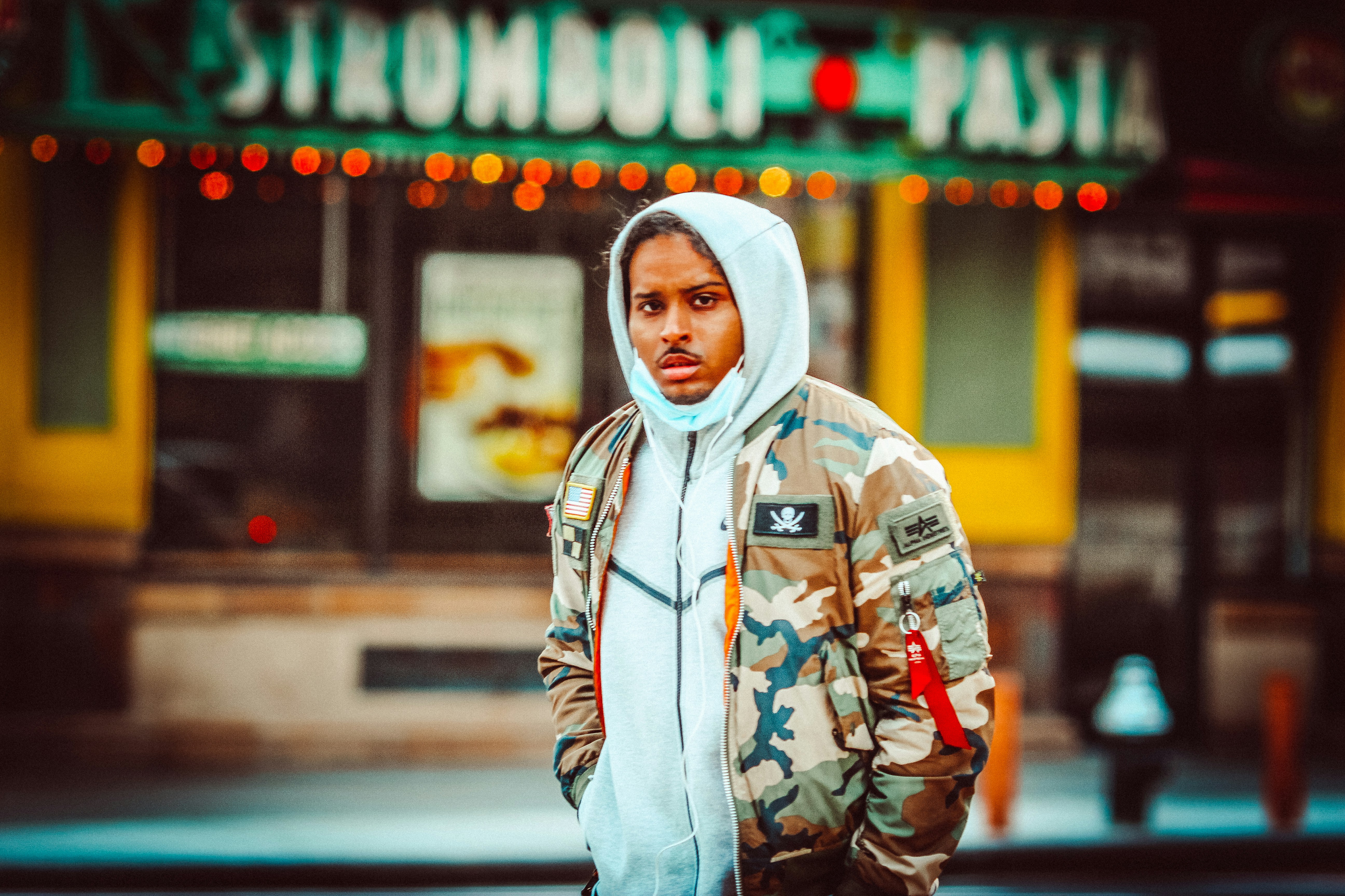 man in gray hoodie standing near during daytime