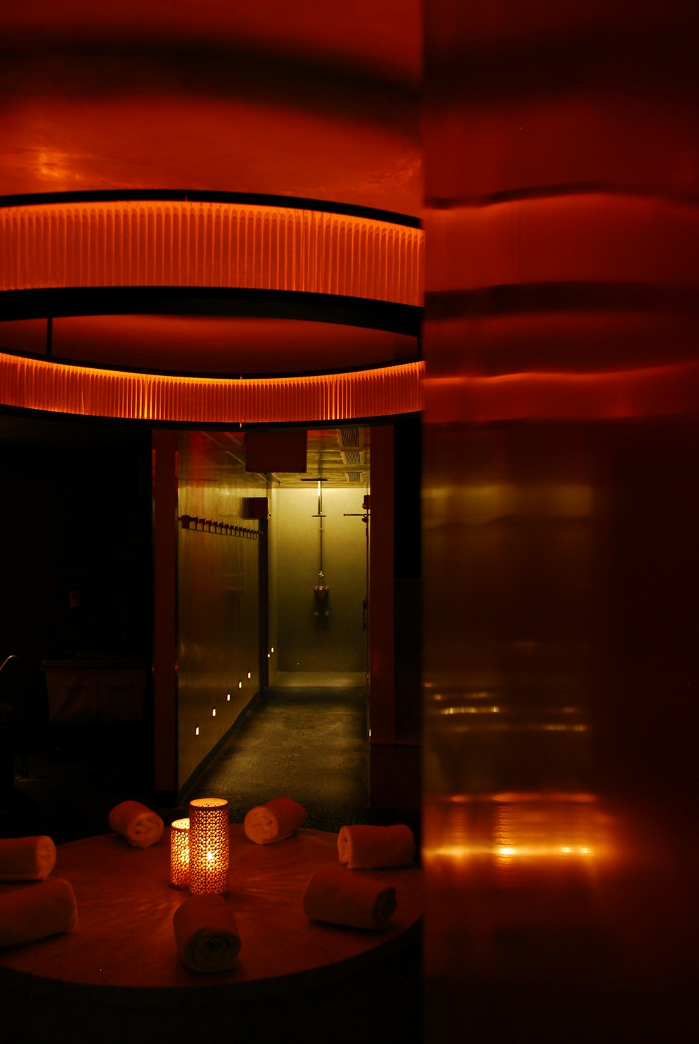 red and brown tunnel with glass windows